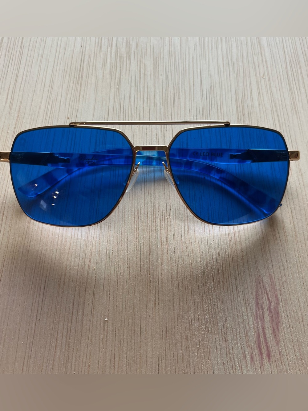 The Leo – Clarity Blue RainbowOptix sunglasses Blue Lens Gold  Frame glasses